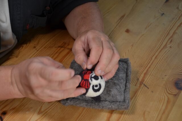 Making our fun panda ornament ball..